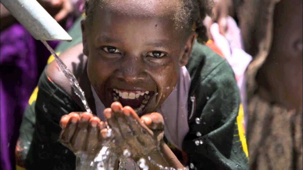 Zambian-Children-Getting-Clean-Water-For-The-First-Time